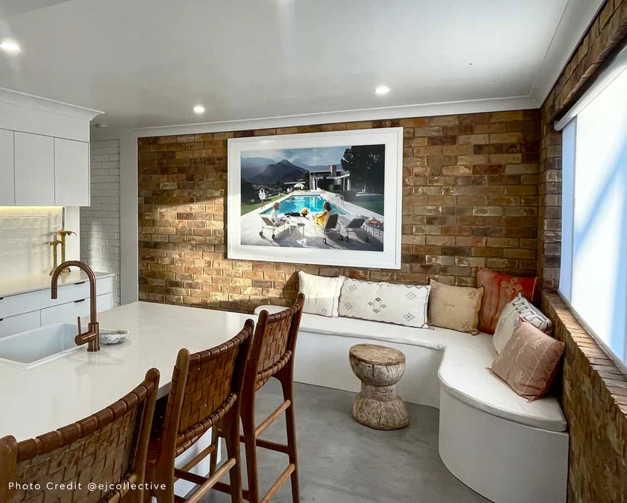 Slim Aarons Poolside Gossip photographic print, iconic Palm Springs 1970 image featuring Lita Baron, Nelda Linsk, and Helen Dzo Dzo, premium artwork with mat board and white self-border. Modern interior.  White Frame.