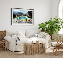 Load image into Gallery viewer, Slim Aarons Poolside Gossip photographic print, iconic Palm Springs 1970 image featuring Lita Baron, Nelda Linsk, and Helen Dzo Dzo, premium artwork with mat board and white self-border. Modern Interior.