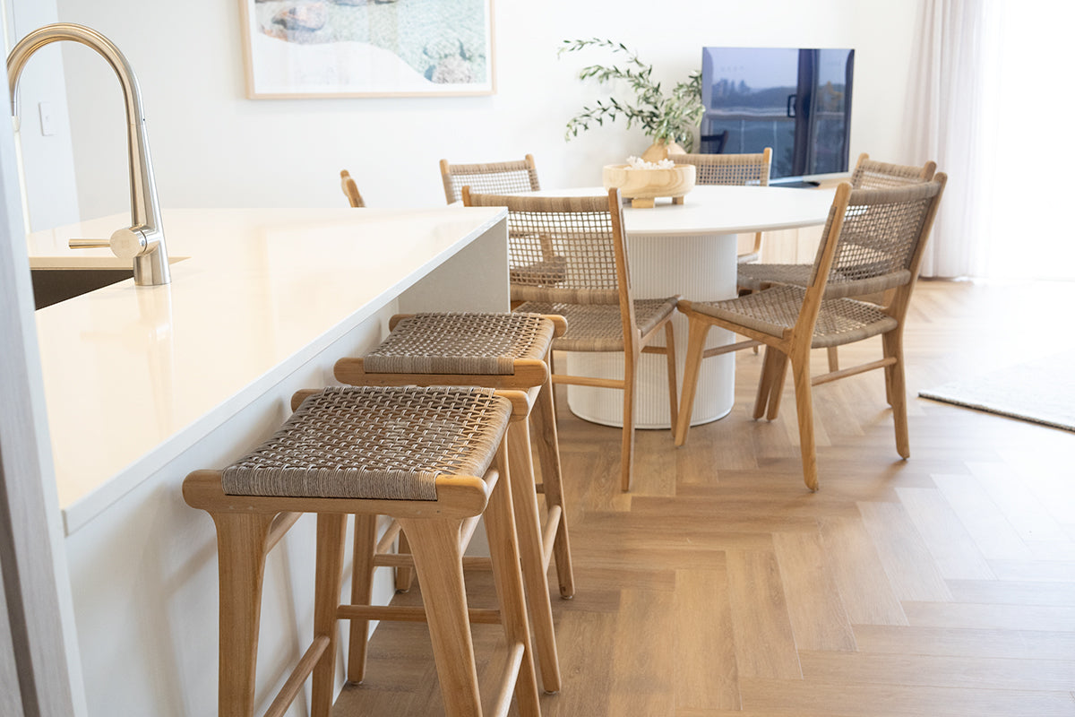 Stradbroke Backless Counter Stool made from solid Teak with woven Viro outdoor cord seat, minimalist design for indoor or outdoor use.  Styled beautifully in this coastal home.