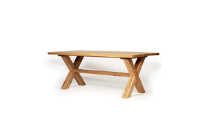 Surfer Dining Table made from premium A-Grade American Oak with a natural raw finish, perfect for elegant Sunday meals with family. Side angle view