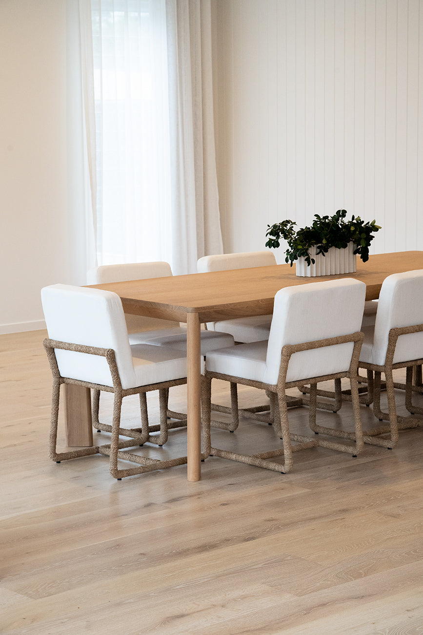 Great Dining Table made from solid American Oak with a raw Osmo PolyX finish, designed as a durable and elegant dining centerpiece. Styled in this beauttiful modern home.