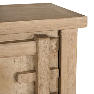 Bulu Bedside Table with left-hand door, handcrafted from reclaimed timber with natural weathered texture and carved details, coastal organic furniture with timeless character. Close up 1.