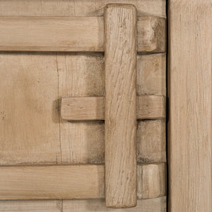 Bulu Bedside Table with left-hand door, handcrafted from reclaimed timber with natural weathered texture and carved details, coastal organic furniture with timeless character. Close up 2.