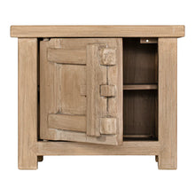 Load image into Gallery viewer, Bulu Bedside Table with left-hand door, handcrafted from reclaimed timber with natural weathered texture and carved details, coastal organic furniture with timeless character.  Door open view.