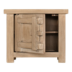 Bulu Bedside Table with left-hand door, handcrafted from reclaimed timber with natural weathered texture and carved details, coastal organic furniture with timeless character.  Door open view.