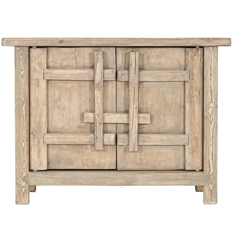 From the Bulu Collection the 2D storage cabinet is crafted from reclaimed vintage elm and pine with natural weathered details. Front perspective.