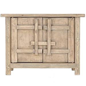 From the Bulu Collection the 2D storage cabinet is crafted from reclaimed vintage elm and pine with natural weathered details. Front perspective.