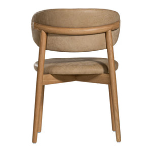 Capri Dining Chair in Enoki by Uniqwa – luxury modern style with buffalo leather upholstery and white oak frame, ideal for refined residential or commercial interiors. Back view