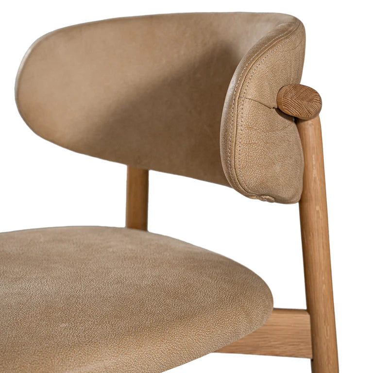 Capri Dining Chair in Enoki by Uniqwa – luxury modern style with buffalo leather upholstery and white oak frame, ideal for refined residential or commercial interiors. Detail view