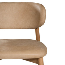 Load image into Gallery viewer, Capri Dining Chair in Enoki by Uniqwa – luxury modern style with buffalo leather upholstery and white oak frame, ideal for refined residential or commercial interiors. Detail view 1