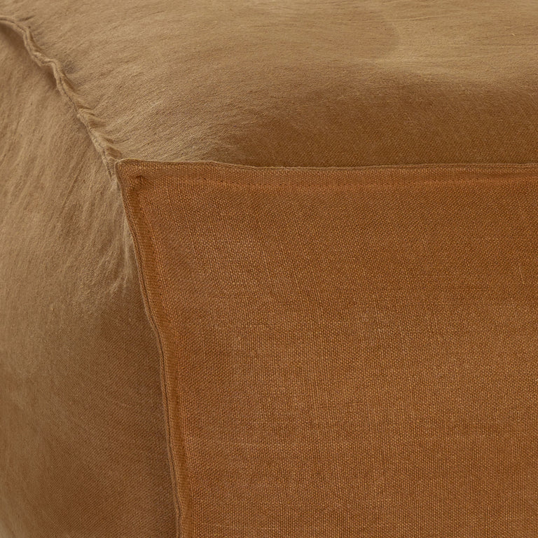 Hendrix Bedhead in clay with feather cushioning and removable linen slipcover, timber frame upholstered bedhead for modern coastal bedroom style.