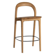 Load image into Gallery viewer, Loki Bar Chair in solid oak with natural finish, featuring sculptural minimalist design, rich wood grain, and black iron footrest for a modern touch.