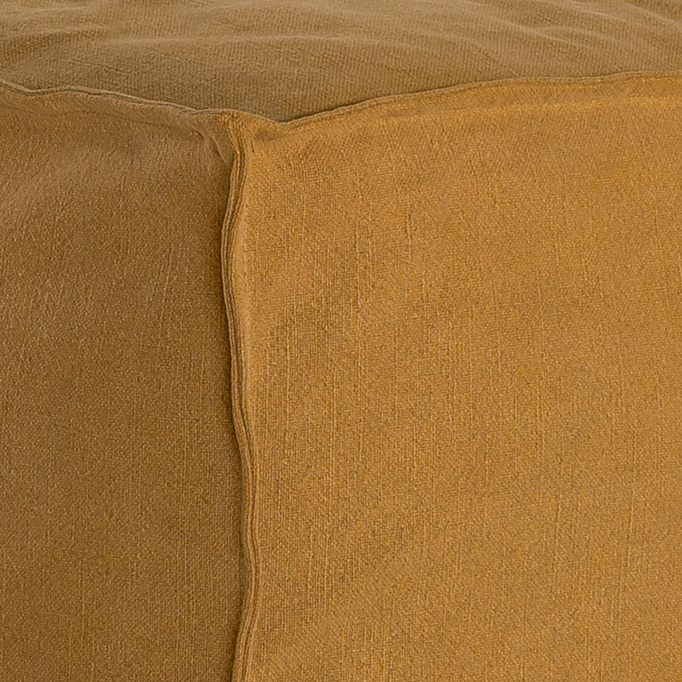 Hendrix Bedhead in ochre with feather cushioning and removable linen slipcover, timber frame upholstered bedhead for modern coastal bedroom style.