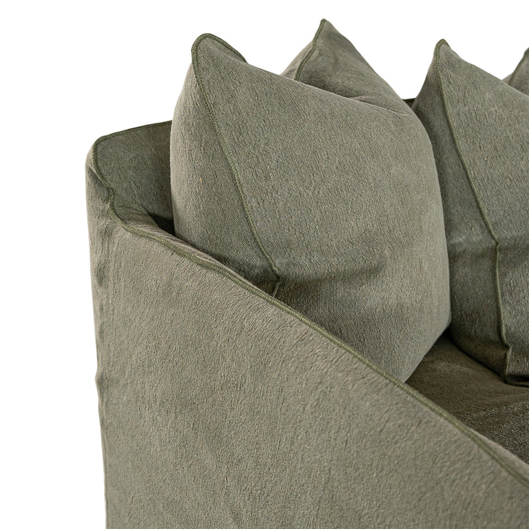 Singita Sofa with hardwood frame, feather-filled cushions and removable slipcovers in luxury linen in Bay Leaf.