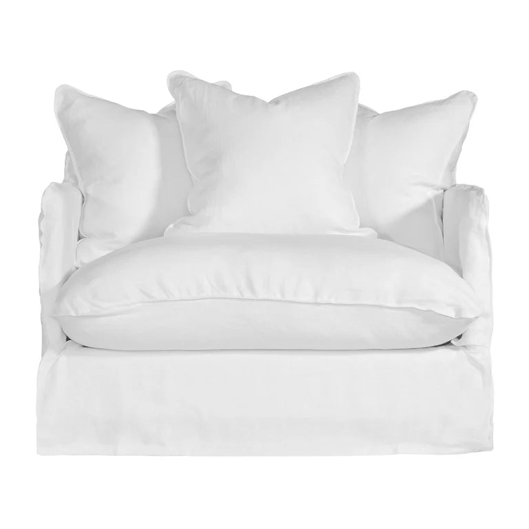 Singita Sofa with hardwood frame, feather-filled cushions and removable slipcovers in luxury linen in white. Front perpective.