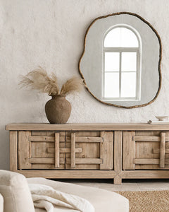 Bulu entertainment unit in reclaimed elm timber with antique hand-carved details and unique weathered markings. Lifestyle inspiration in a modern villa style interior.