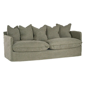 Singita Three Seater Sofa with hardwood frame, feather-filled cushions and removable slipcovers in luxury linen in bay leaf.