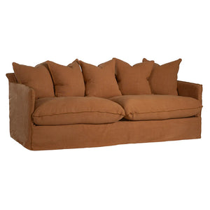 Singita Three Seater Sofa with hardwood frame, feather-filled cushions and removable slipcovers in luxury linen in clay.