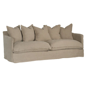 Singita Three Seater Sofa with hardwood frame, feather-filled cushions and removable slipcovers in luxury linen in oatmeal.