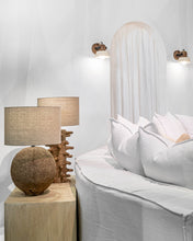 Load image into Gallery viewer, Sula Table Lamp handcrafted from eco-friendly papier-mâché with an organic spike design, casting a soft ambient glow and unique shadow play. Styled beautifully in Uniqwa&#39;s showroom.