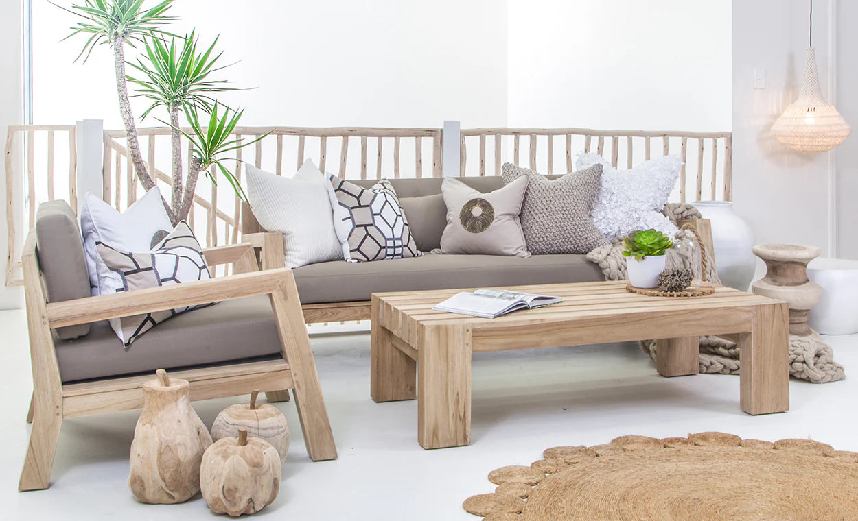 Harper Three Seater Outdoor Sofa by Uniqwa Collections, featuring clean-lined design in reclaimed aged teak with UV-protected, water and mould-resistant cushions—modern and durable outdoor seating. Styled in showroom.