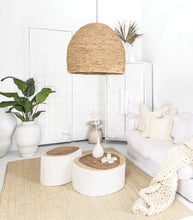 Load image into Gallery viewer, Singita Four Seater Sofa by Uniqwa with hardwood frame, feather-filled cushions and removable slipcovers in luxury linen in white. Styled beautifully in this tribal luxe interior.