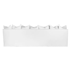 Singita Four Seater Sofa by Uniqwa with hardwood frame, feather-filled cushions and removable slipcovers in luxury linen in white. Back perspective.
