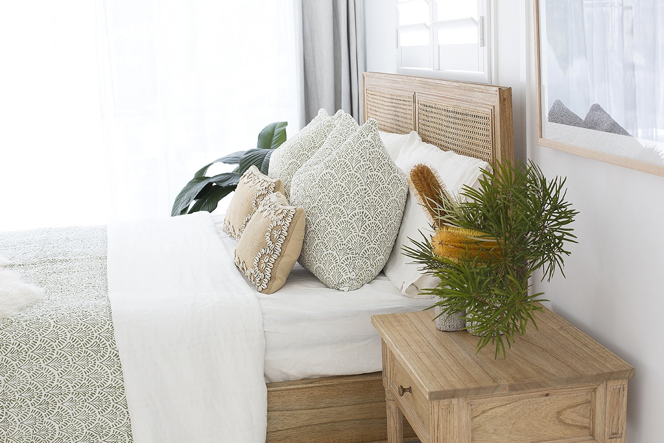 Whitsunday Cane Bed styled in a coastal Australian bedroom with natural textures