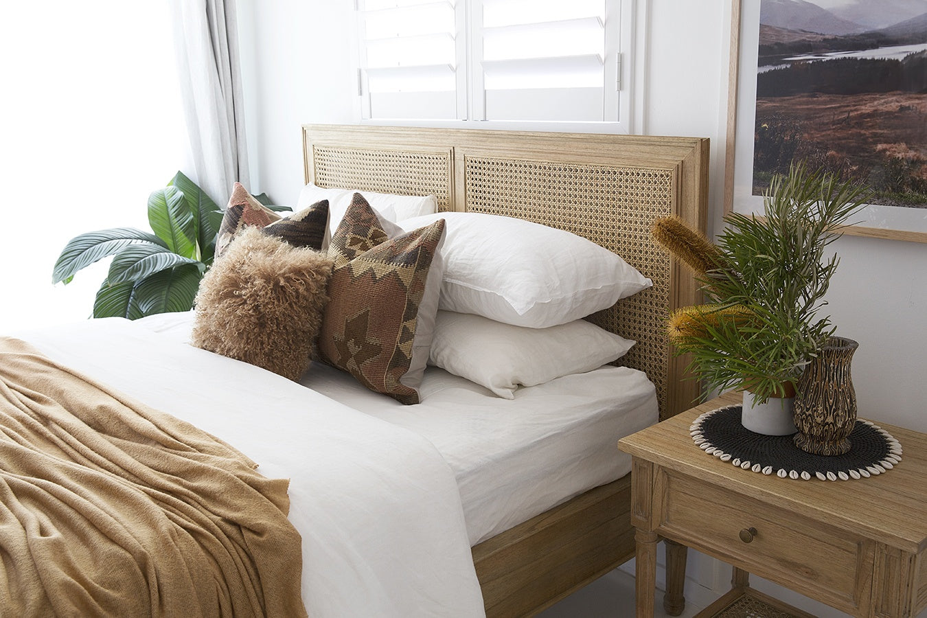 Whitsunday Cane Bed styled in a relaxed modern bedroom interior