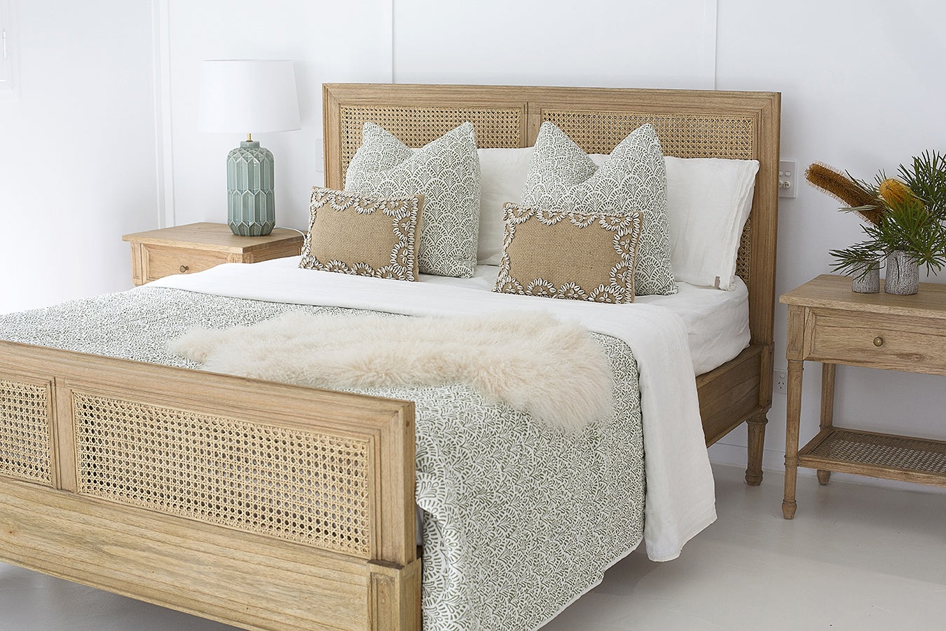 Whitsunday Cane Bed styled in a mdoern coastal Australian bedroom with neutral tones and natural textures