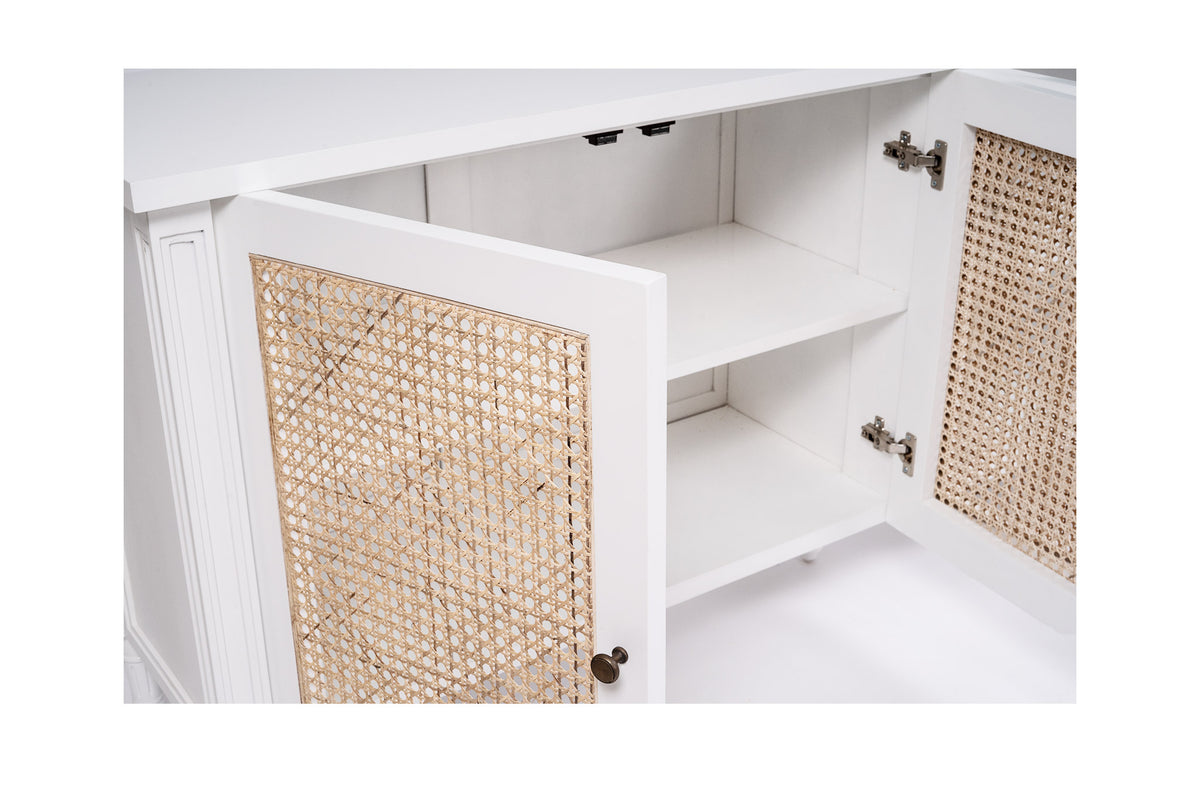 Whitsunday white four-door sideboard with rattan inserts, doors open showing internal shelving