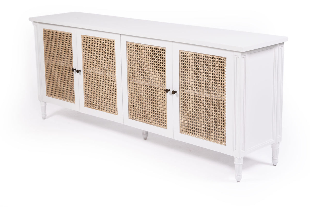 Whitsunday white four-door sideboard with rattan inserts, angled front view