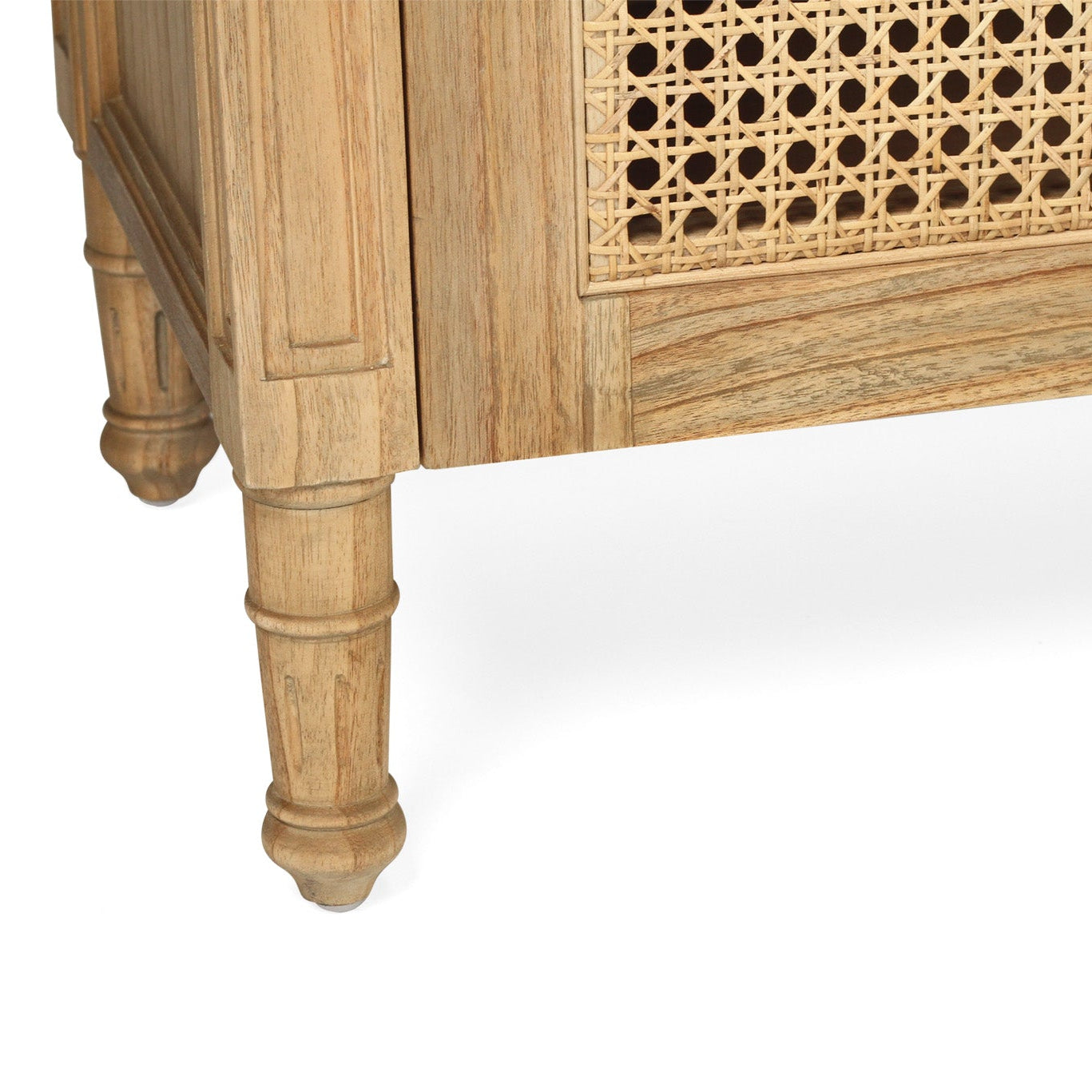 Weathered oak rattan sideboard leg detail showing solid timber craftsmanship