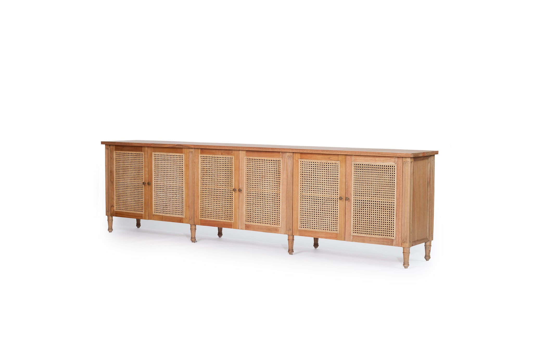 Whitsunday Six Door Sideboard in weathered oak with rattan doors, white cedar timber coastal furniture with versatile storage.  Front angle perspective.