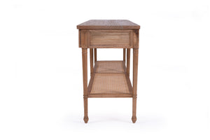 Whitsunday Wide Console Table in natural mahogany with two drawers and rattan shelf, coastal style furniture with storage. Side perspective.