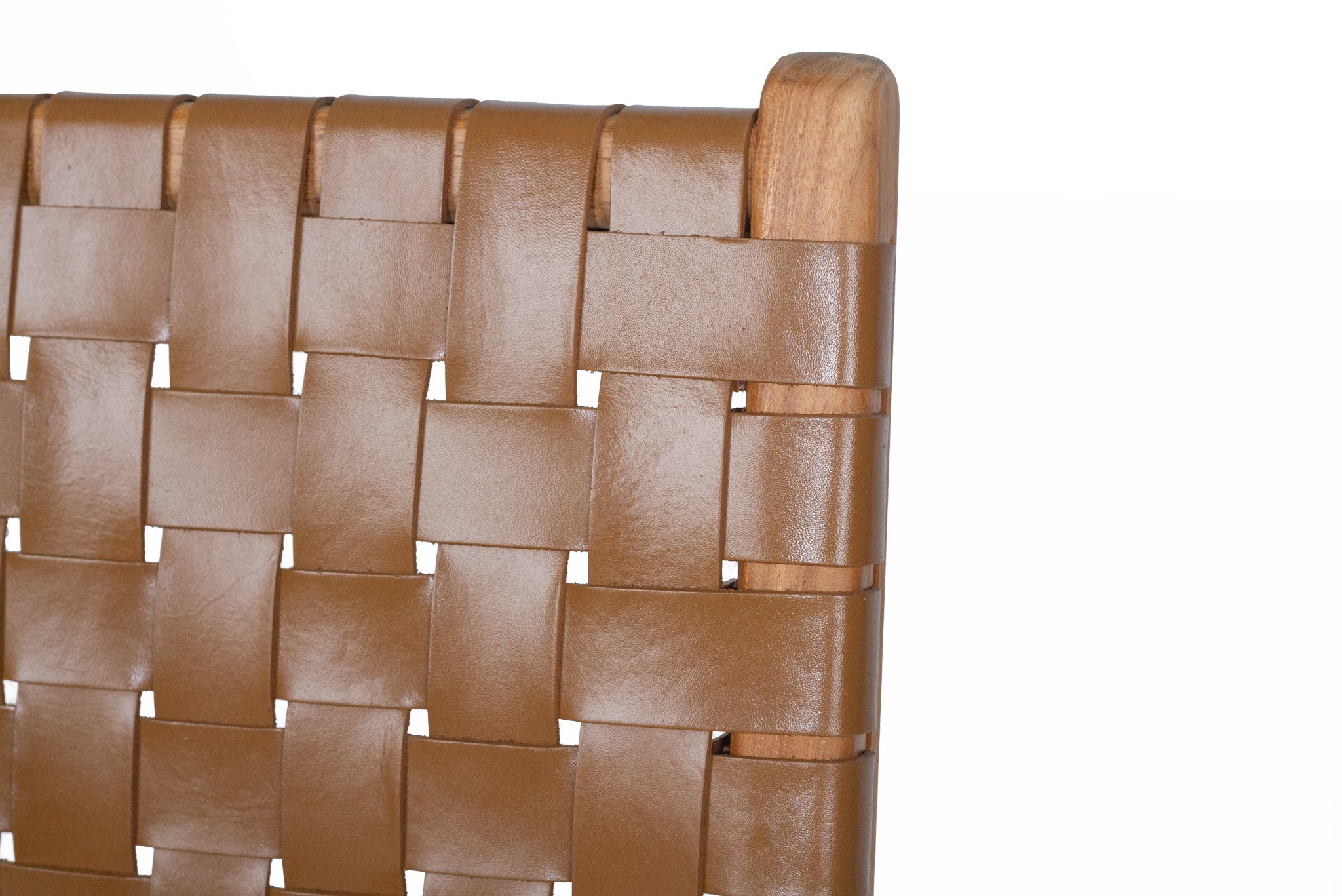 Tan woven leather high back counter stool with sleek modern design, durable and comfortable seating. Backrest detail. Magnolia Lane
