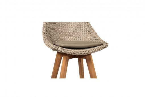 Beach House mushroom outdoor counter stool, close-up of the shaped woven backrest and seat cushion