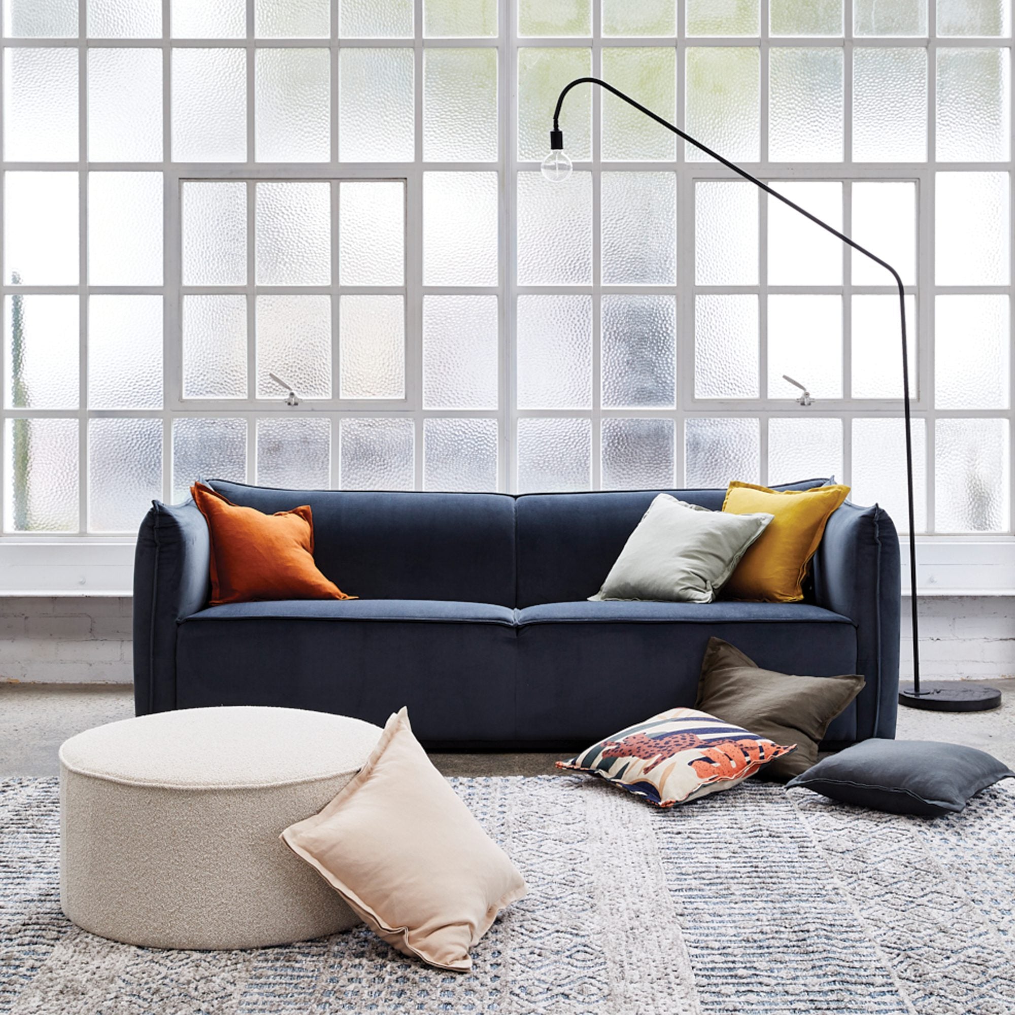 Belamy large round boucle ottoman in oatmeal, Magnolia Lane modern interior