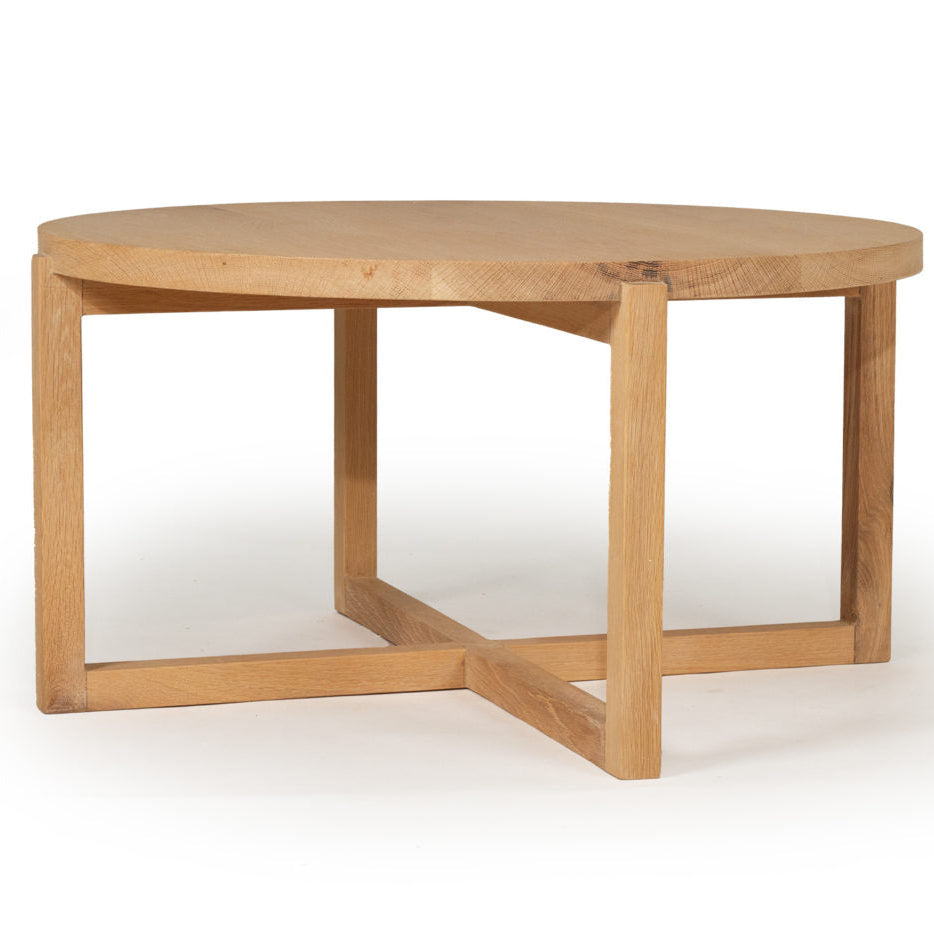 Coast Round Coffee Table in Oak, front angle view.