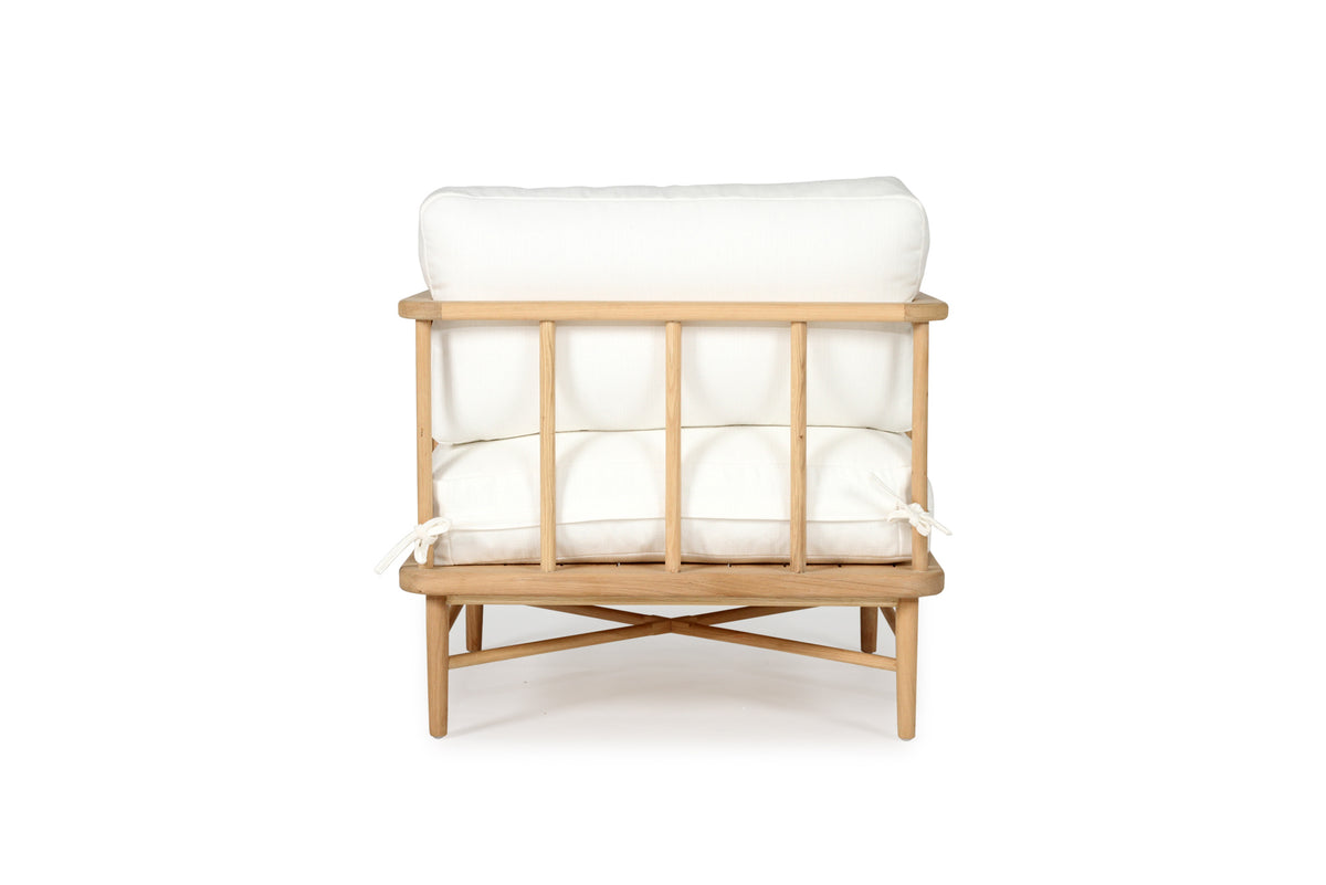 Harbour Island Indoor Armchair + Ottoman, back view.