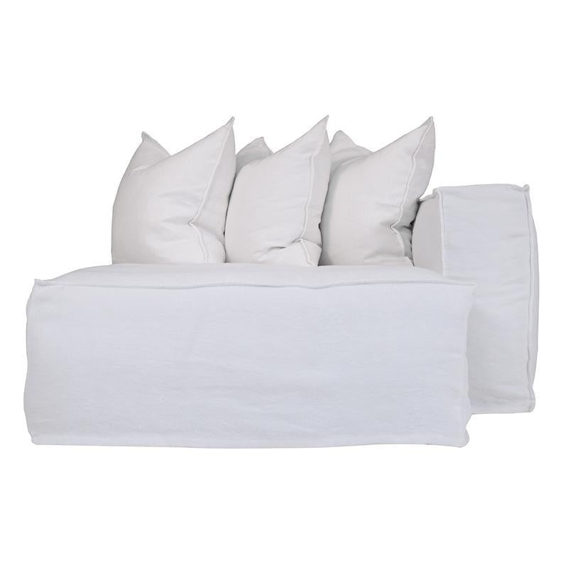 Hendrix Sofa Chaise with right hand arm, with feather cushioning and removable slipcover, timber frame modern coastal sofa with scatter cushions, available in multiple colours. Front perspective.