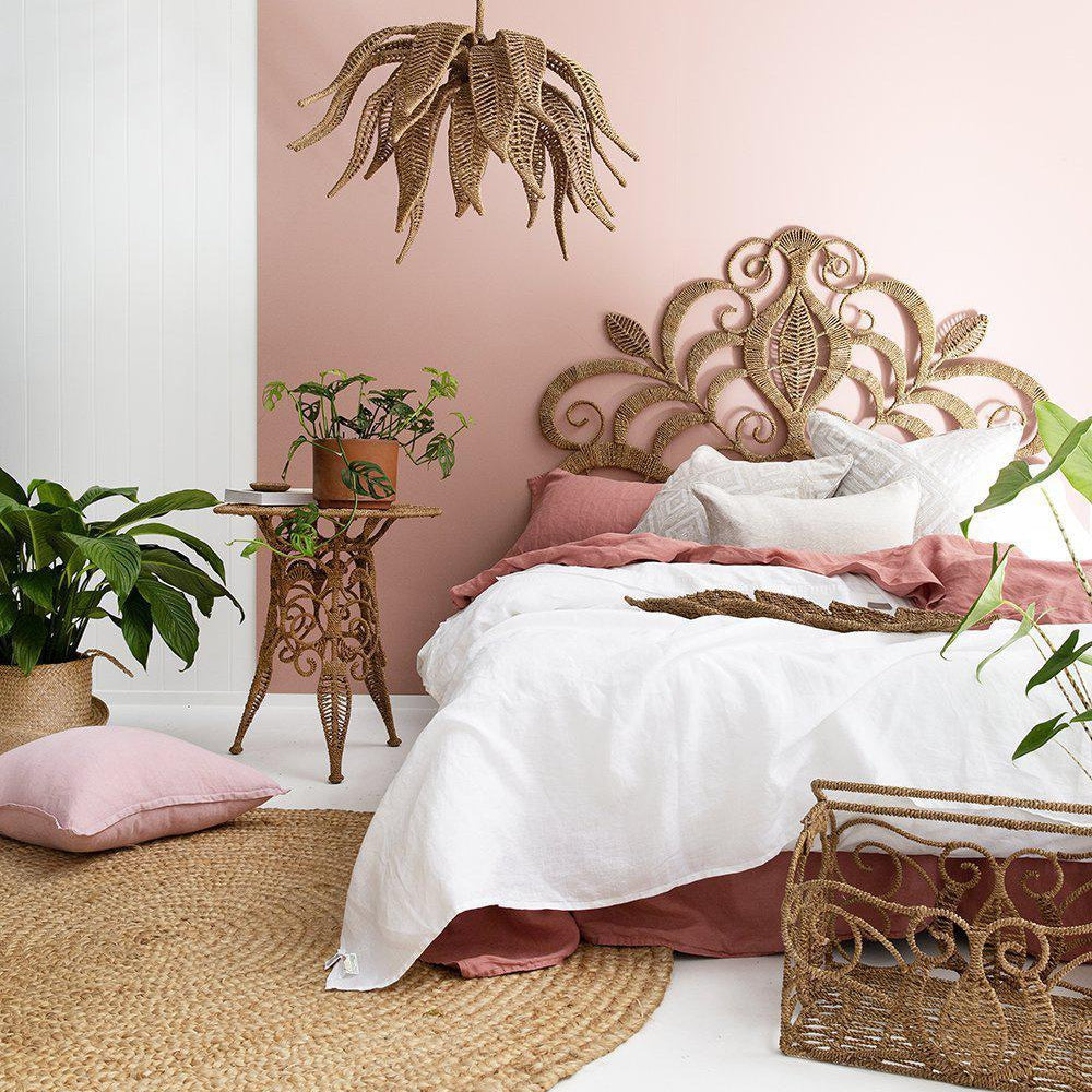 Lotus Chandelier handwoven with seagrass rope over a wrought iron frame, featuring a unique lotus design for a bohemian statement piece.  Magnolia Lane 3