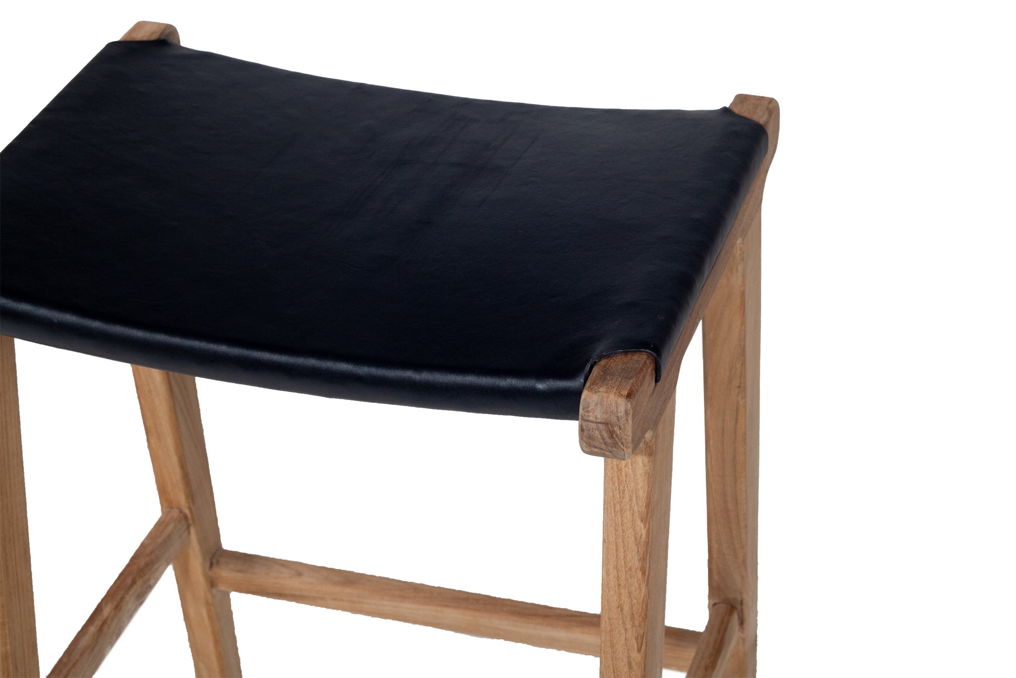 Leather saddle stool in black, Magnolia Lane
