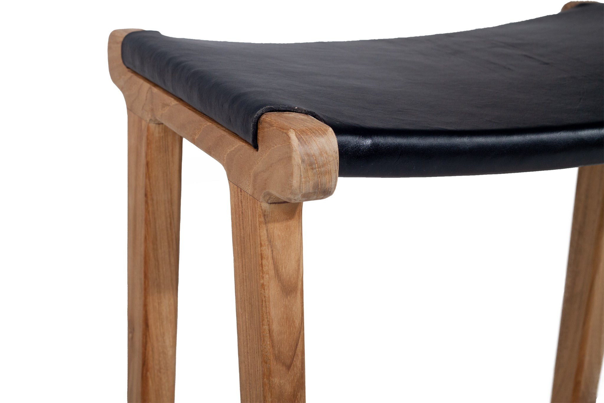 Leather saddle stool in black, Magnolia Lane