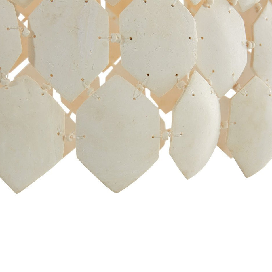 Piatos Hanging Lamp made from natural coconut shell with a brass frame, handcrafted sustainable lighting. Close up perspective