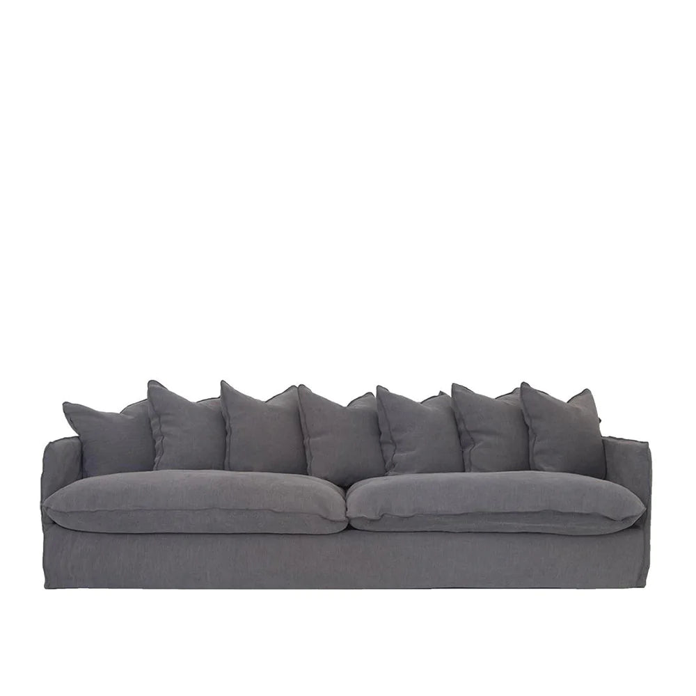 Singita Four Seater Sofa by Uniqwa with hardwood frame, feather-filled cushions and removable slipcovers in luxury linen in Charcoal. Front perspective.