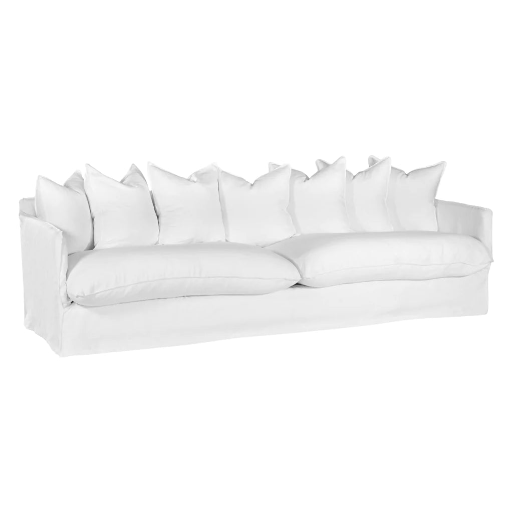 Singita Four Seater Sofa by Uniqwa with hardwood frame, feather-filled cushions and removable slipcovers in luxury linen in white.