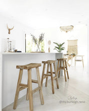 Load image into Gallery viewer, Kusina Barstool by Uniqwa Collections, crafted from solid reclaimed teak with a sleek sanded finish. Featuring natural timber grains and a curved seat, this durable and elegant bar stool adds character to dining spaces, restaurants, or bars. Modern Coastal Home 1.