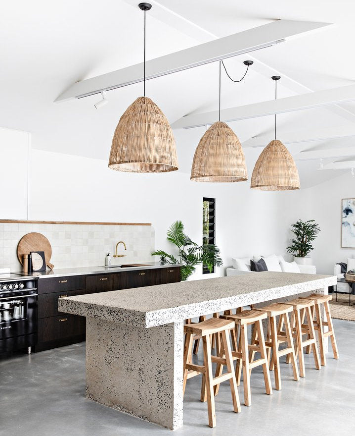Kusina reclaimed teak bar stools styled at a coastal modern kitchen island