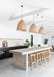 Kusina Barstool by Uniqwa Collections, crafted from solid reclaimed teak with a sleek sanded finish. Featuring natural timber grains and a curved seat, this durable and elegant bar stool adds character to dining spaces, restaurants, or bars. Modern Coastal Home.